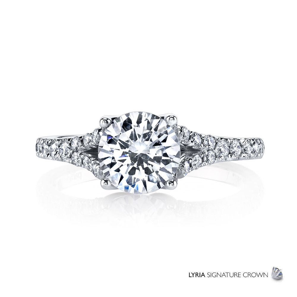 Designer diamond engagement ring, with split shank.