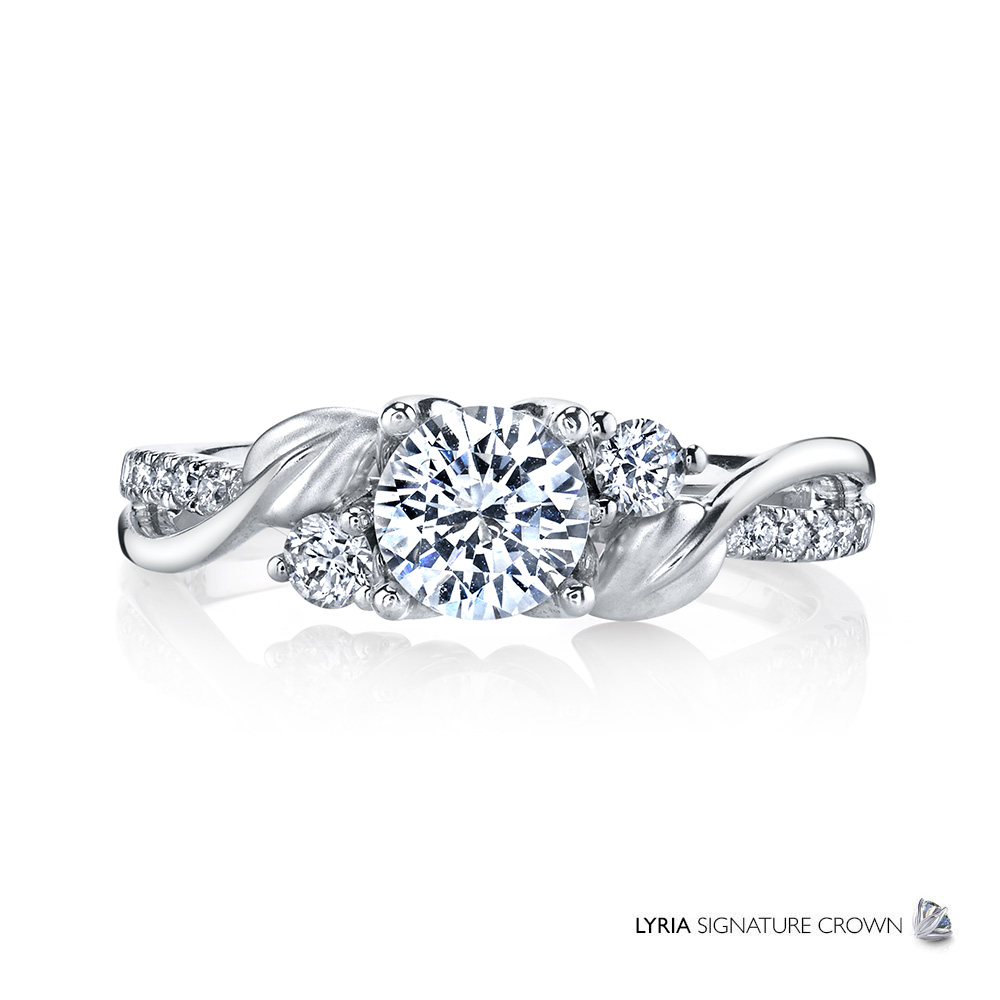 Floral designer diamond engagement ring featuring the Lyria Signature Crown.