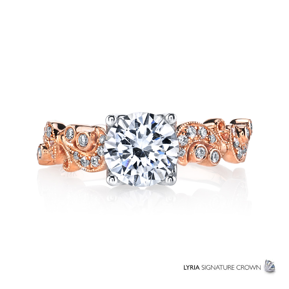 Vintage inspired rose gold designer engagement ring featuring the Lyria Signature Crown.