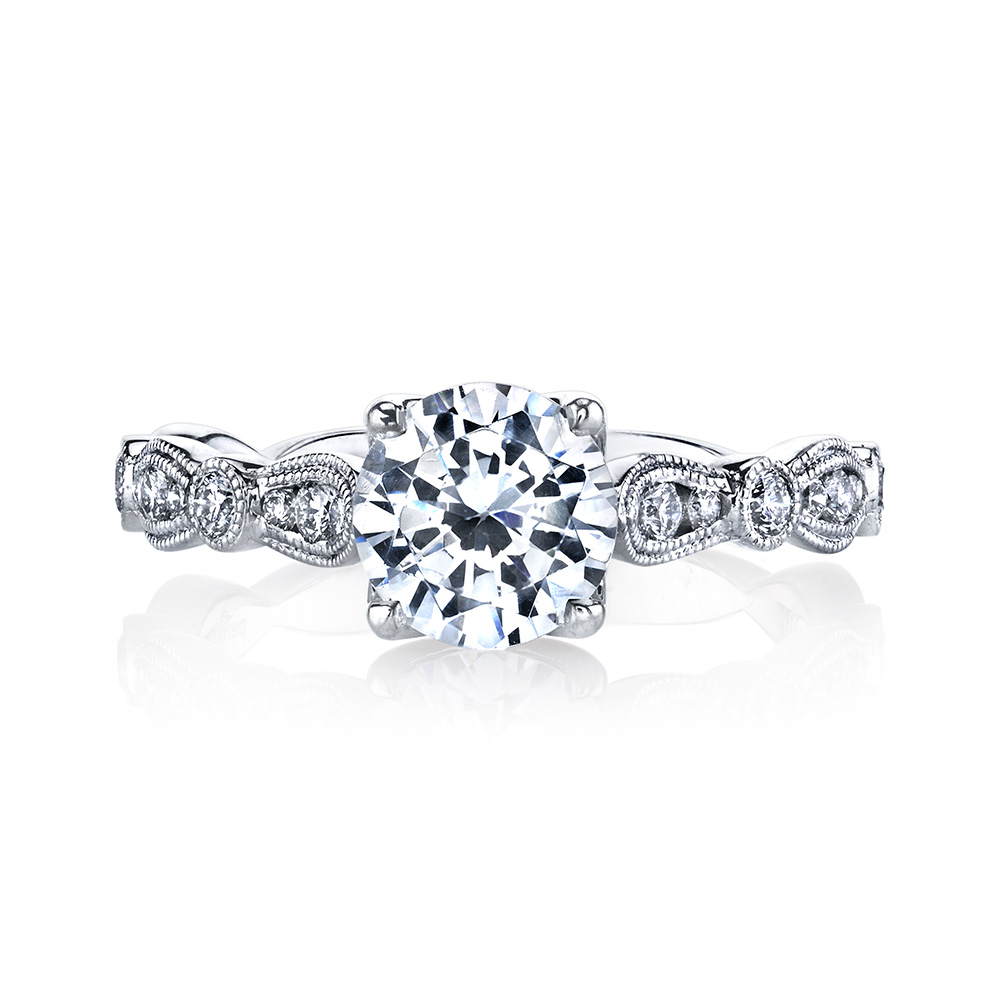 Vintage inspired designer diamond engagement ring featuring the Lyria Signature Crown.