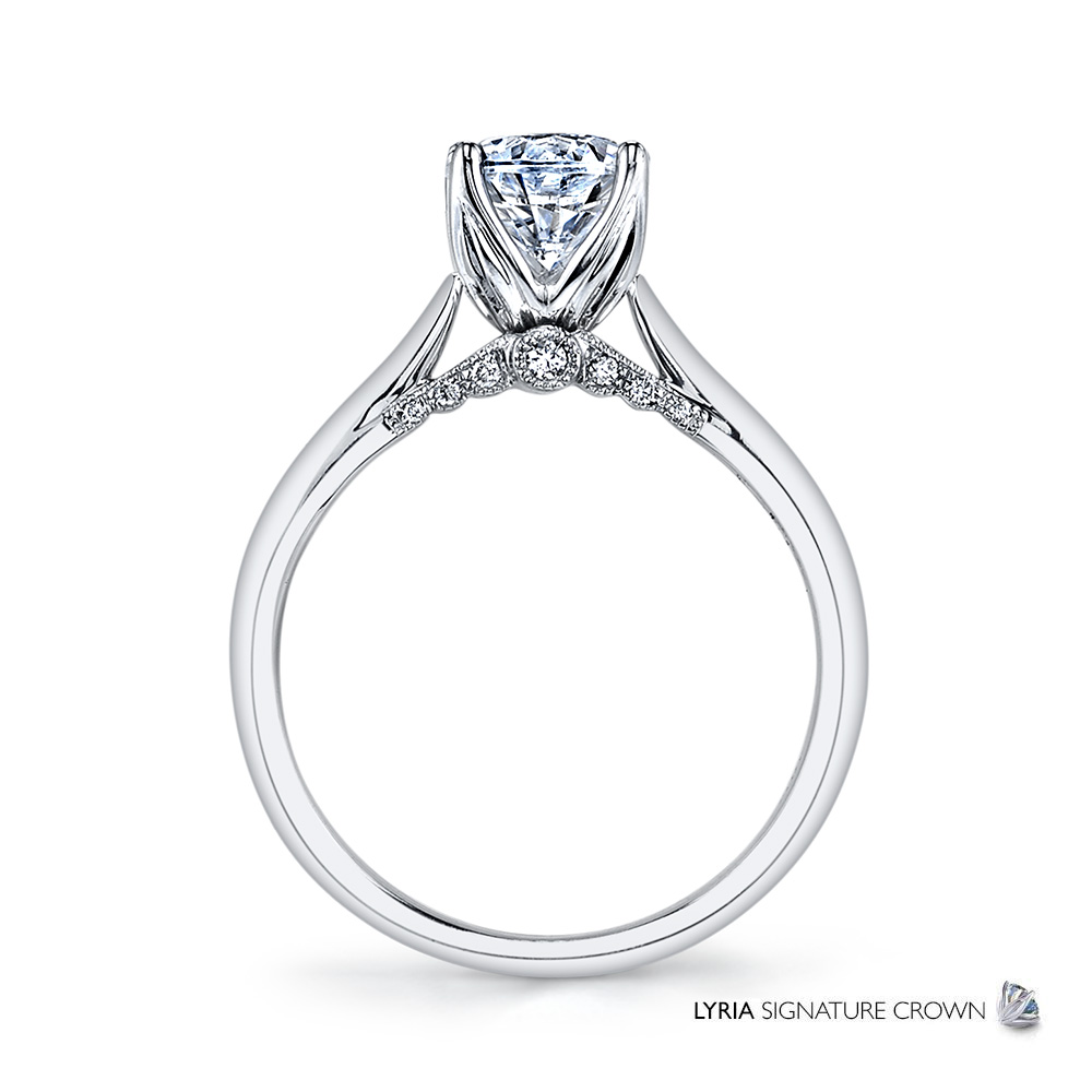 Designer diamond solitaire featuring the Lyria Signature Crown.