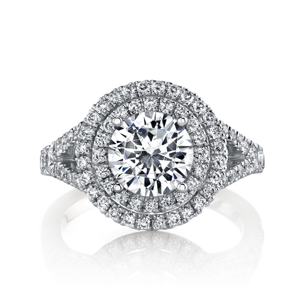 Contemporary designer diamond halo engagement ring by Parade Design.