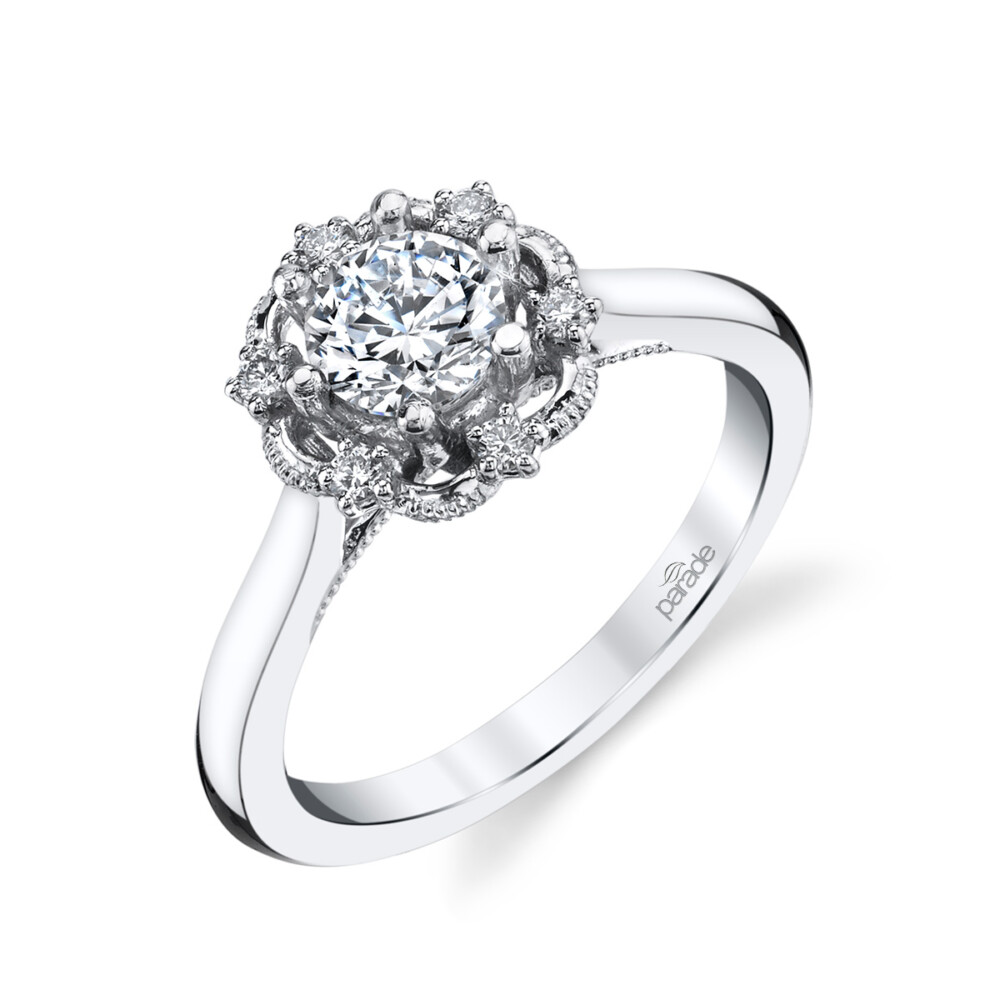 Vintage designer diamond halo engagement ring by Parade Design.