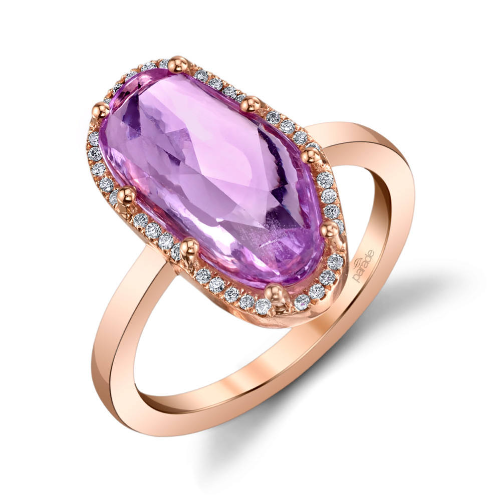 Designer diamond halo and pink sapphire fashion ring by Parade Design.