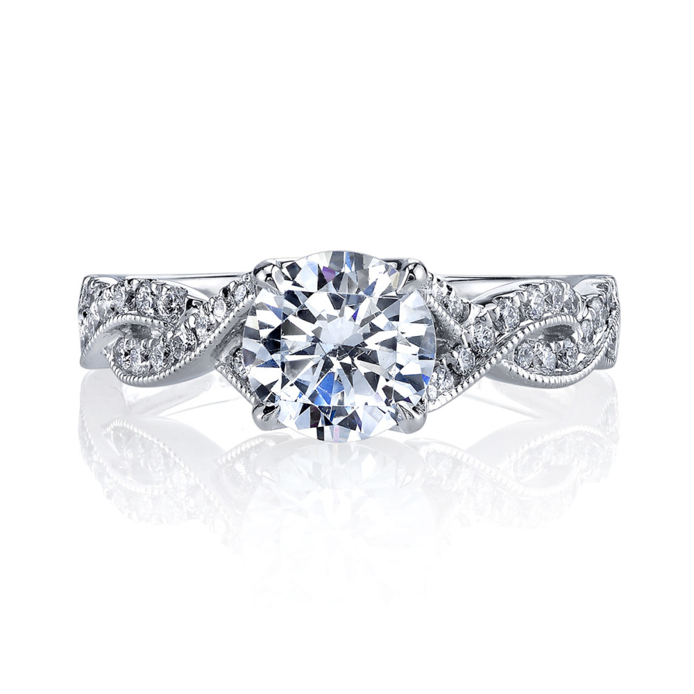 Contemporary designer diamond engagement ring featuring a twisted band by Parade Design.